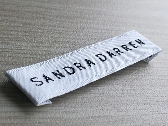 label kaos woven